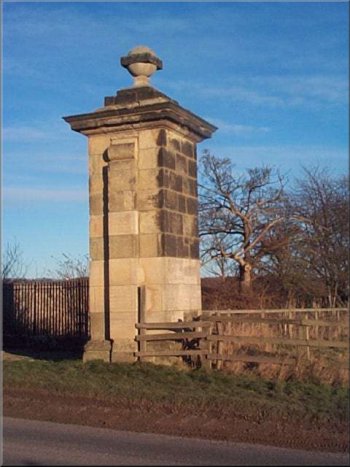 Impressive stone pillar on Castle Howard drive opposite the car park