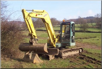 This week's bit of machinery - and excavator parked up in a field