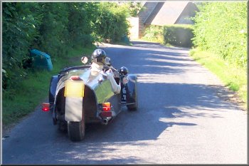 3-wheel sports car on the hill into Littlebeck