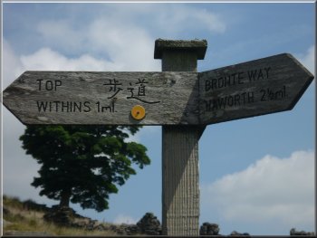 One of several sign posts in English & Japanese