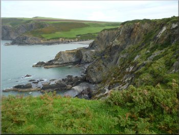 Looking bacl along the rocky coast to Pwllgwaelod