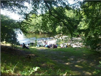 Popular spot on the river bank at Redmire Force