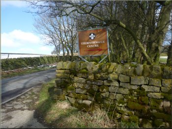 Scout campsite sign at the road