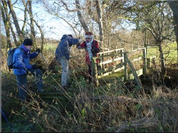 Picking our way across a collapsed fence & stile