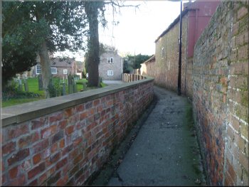 The alley way along the side of the Catholic Church