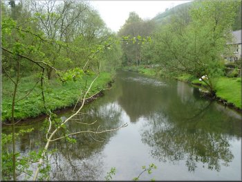 The River Wye seen from the footbridge at Litton Mill