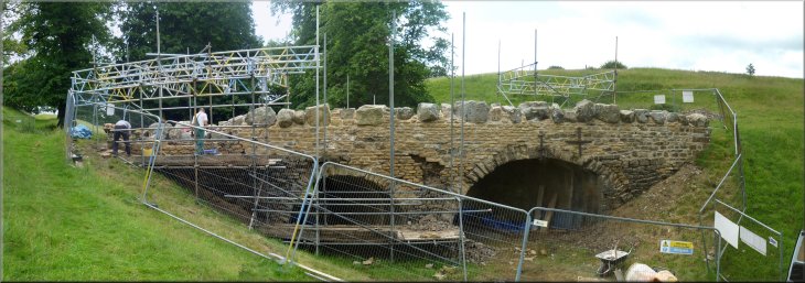 Repairs underway at the ornamental stone bridge