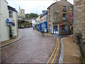 Walking along 'The Hill' through Hawes