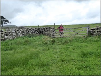 We crossed the field from the stone barn to this gate
