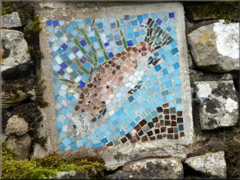 Trout mosaic in the wall at our turning off the road
