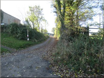 Start of Broughton Lane on the far side of the B1257
