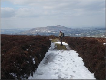 Continuing along the moorland track to the south west