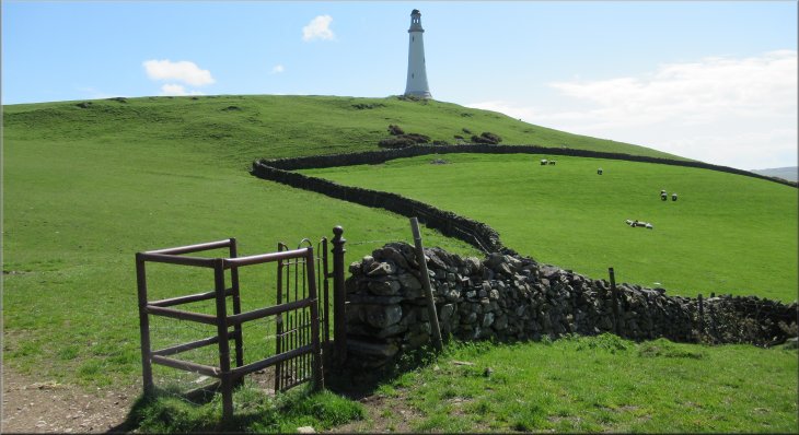 Looking back to the monument on Hoad Hill from the track on the north side of the hill on our way down
