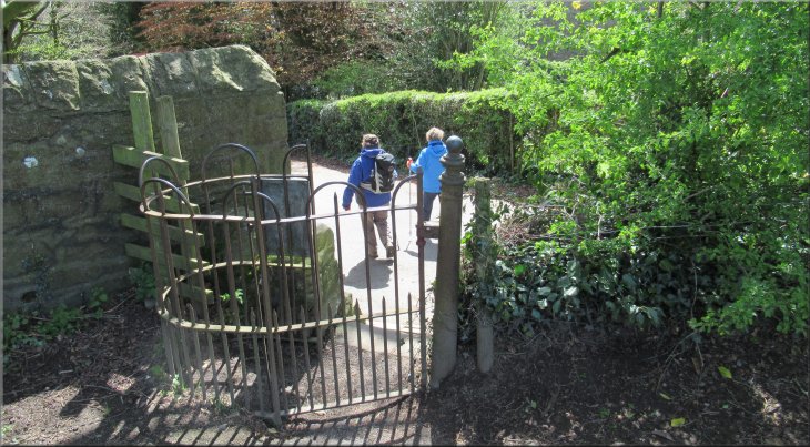 Iron kissing gate to a walled track into Ulverston