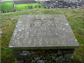 One of the seven plinths at the hill fort site