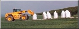 Forklift truck stockpiling fertilizer near Huggate