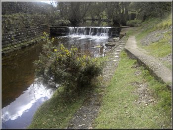 Pretty waterfall over the weir at Goathland Station