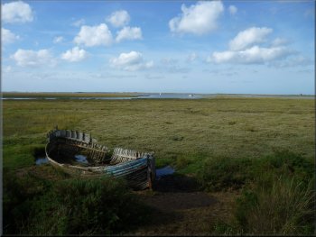 A hull left to rot into the marshes