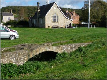 Miniature bridge and village hall at Sinnington