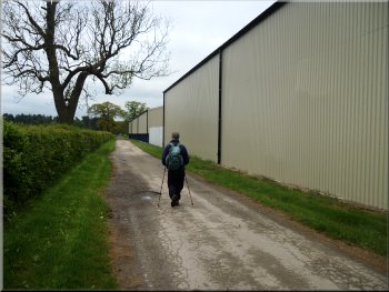 Passing some of the modern farm buildings by the access road