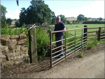 Gate on to the farm access drive at Acaster Hill