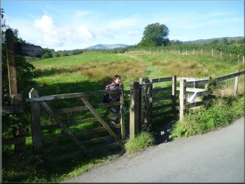 Start of the permissive footpath following the road