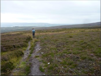 The bridleway drops down the moor towards March Ghyll Reservoir