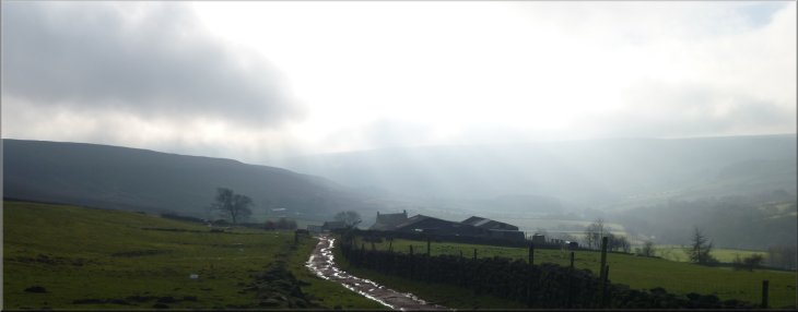Looking back over Beak Hills Farm to the mist in Raisdale