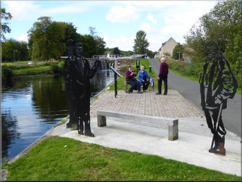 Iron sculpture of John Smeaton & others by the canal