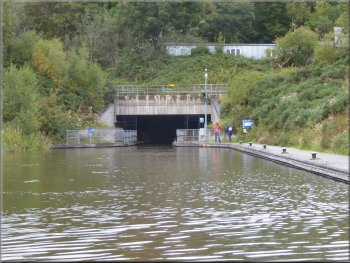 The boat has turned round to re-enter the tunnel