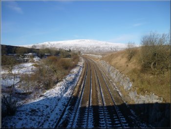 View NW from the railway bridge to Whernside