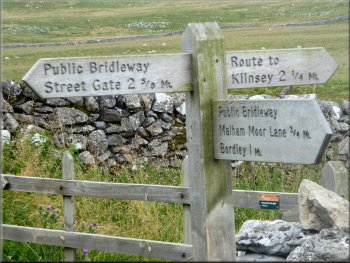 The sign post at Mastiles Gate
