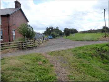 Looking back past Ellerby Crossing Cottage at Coverdale Lane
