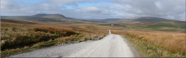 Looking back along the Dales Way with Ingleborough on the left and Whernside on the right