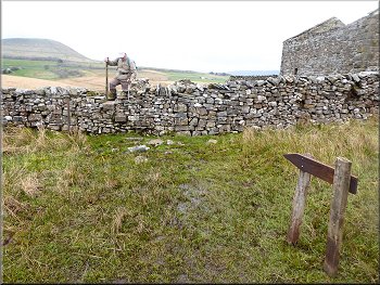 Stile by a ruined farm building at map ref. SD 784 790 on the Ribble Way