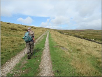 Continuing along the track across the grassy moorland