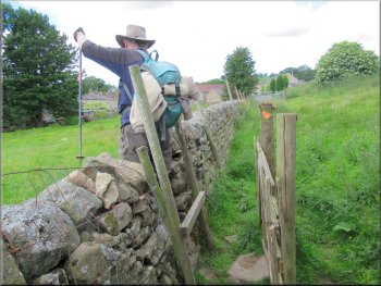 Awkward stile to cross a wall & continue on the other side