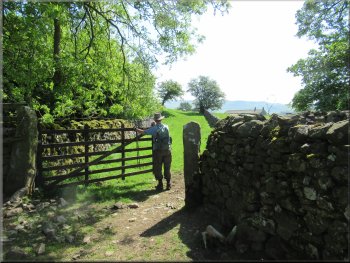 Gateway on to a wide grassy walled track
