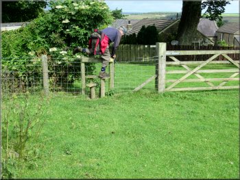 Stile to the track by the farm house