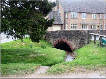 Bridge over the beck at the road junction in Ruston
