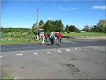 Crossing the B6350 to the public telephone box