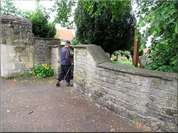Gate into the churchyard from Canons Garth Lane